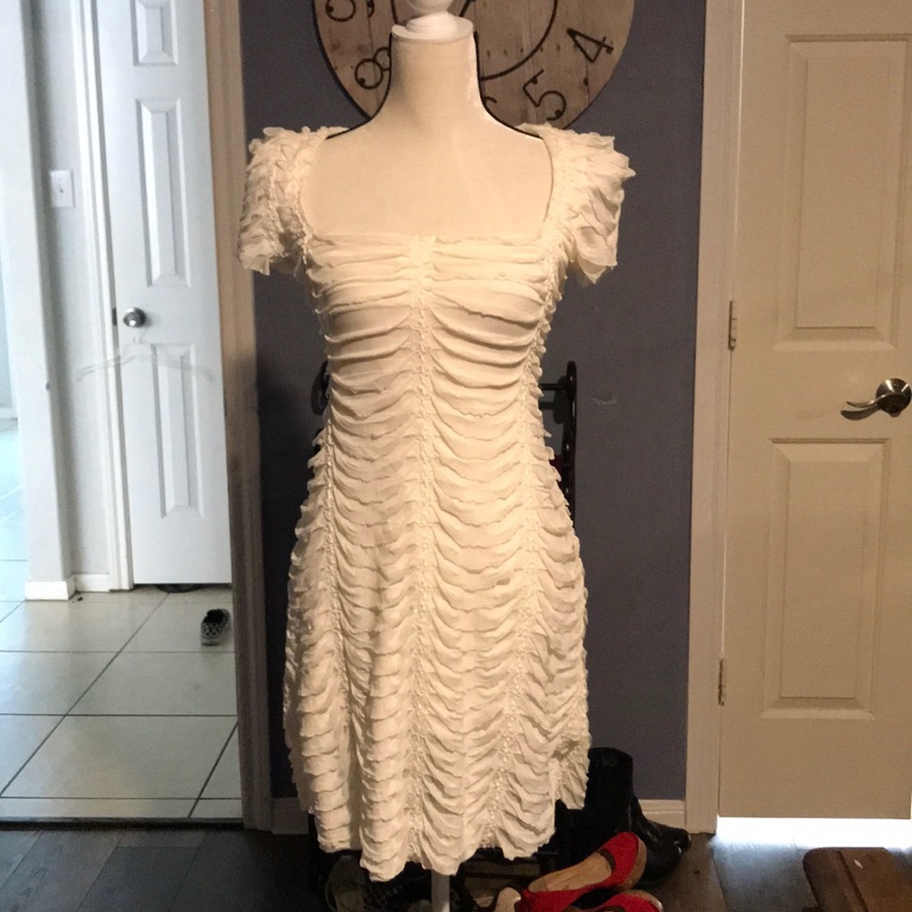 Vintage white cream with beautiful stitching.